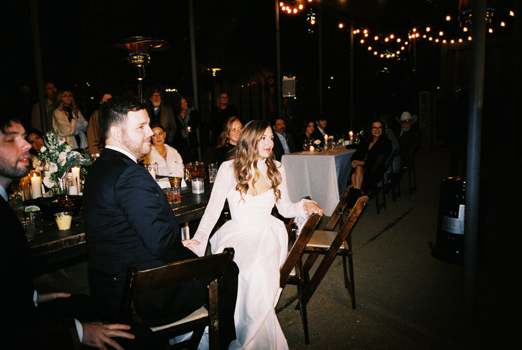 Joyful wedding reception with dancing at Springdale Station on film