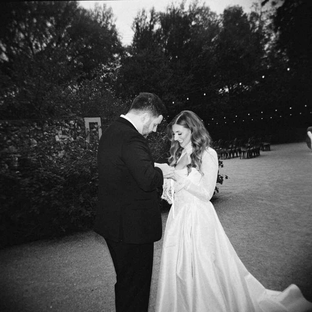 Emotional first look during an intimate wedding in Austin, Texas photographed on film