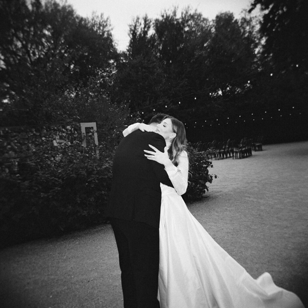 Emotional first look during an intimate wedding in Austin, Texas photographed on film