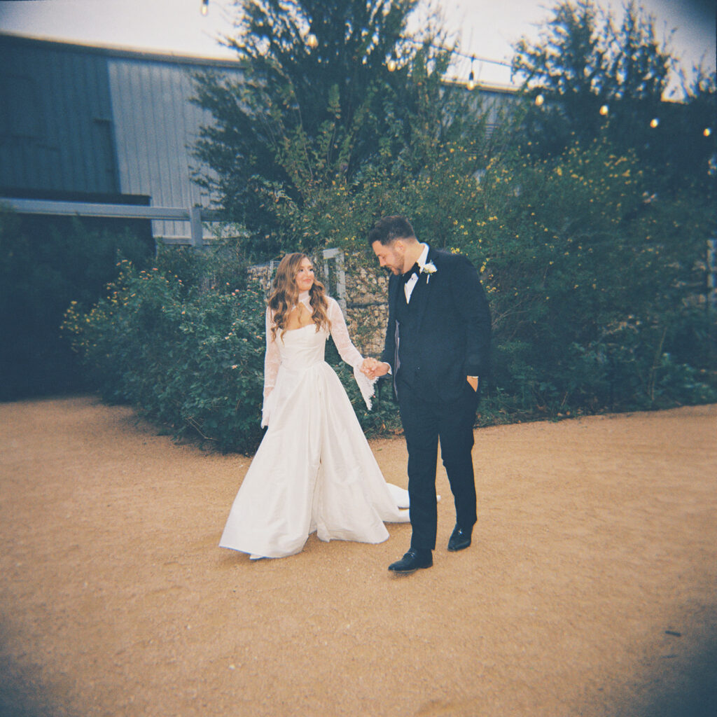 Emotional first look during an intimate wedding in Austin, Texas photographed on film