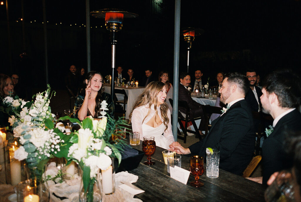 Joyful wedding reception with dancing at Springdale Station on film