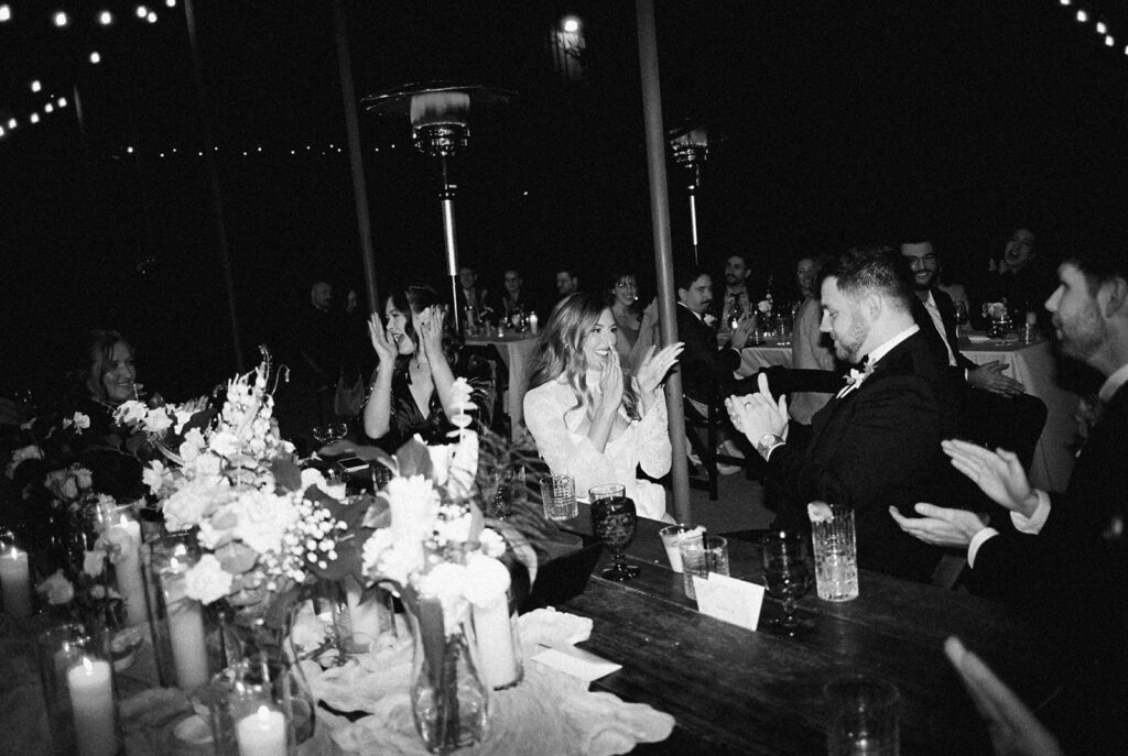 Joyful wedding reception with dancing at Springdale Station on film