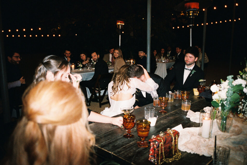 Joyful wedding reception with dancing at Springdale Station on film