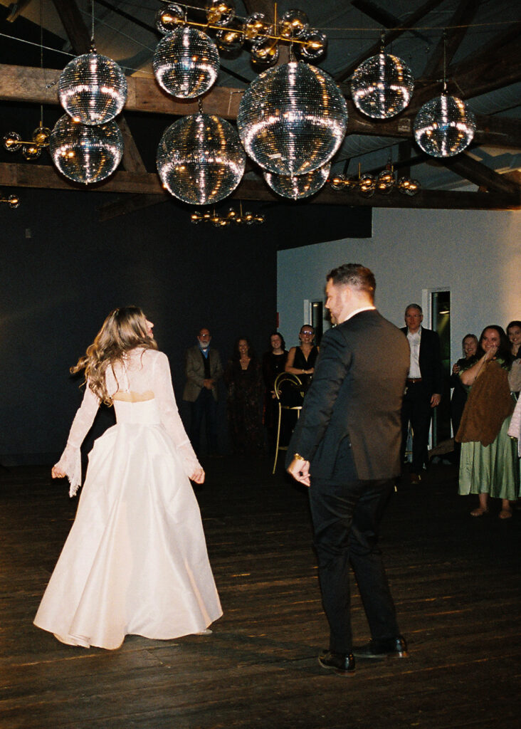 Guests dancing during a lively wedding reception in Austin, Texas on film