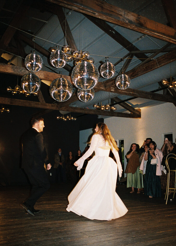 Guests dancing during a lively wedding reception in Austin, Texas on film