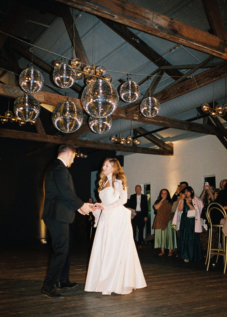 Guests dancing during a lively wedding reception in Austin, Texas on film