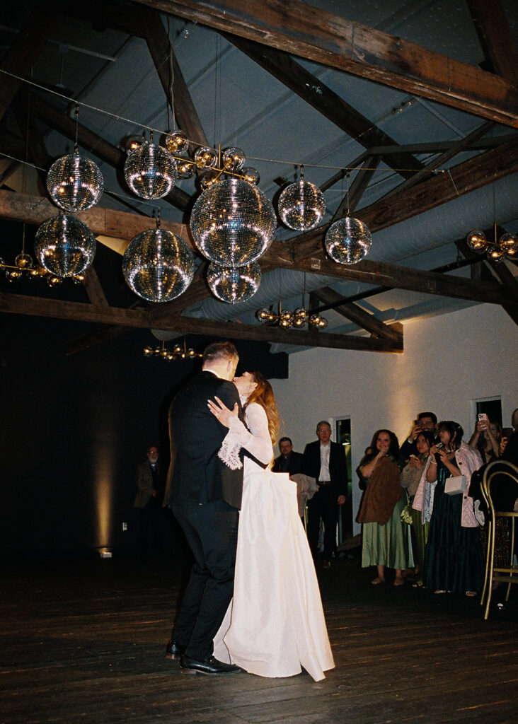 Guests dancing during a lively wedding reception in Austin, Texas on film