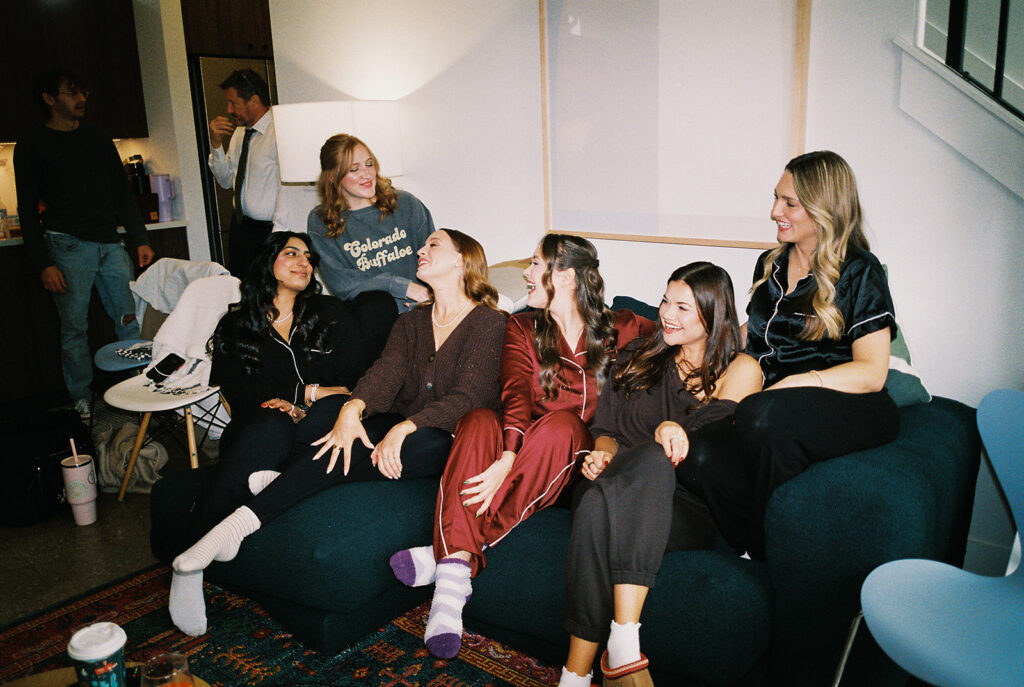 bride and groom getting ready for an Intimate wedding at Springdale Station in Austin, Texas photographed on film
