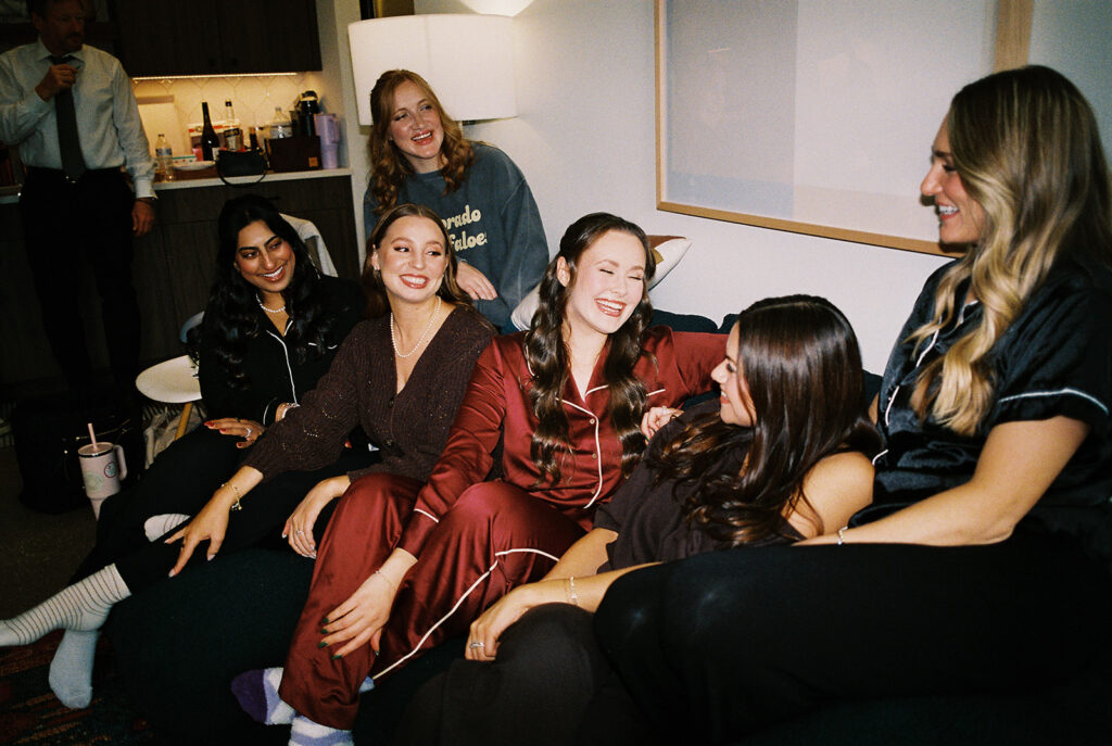 bride and groom getting ready for an Intimate wedding at Springdale Station in Austin, Texas photographed on film