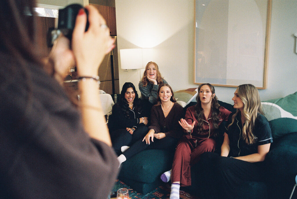 bride and groom getting ready for an Intimate wedding at Springdale Station in Austin, Texas photographed on film
