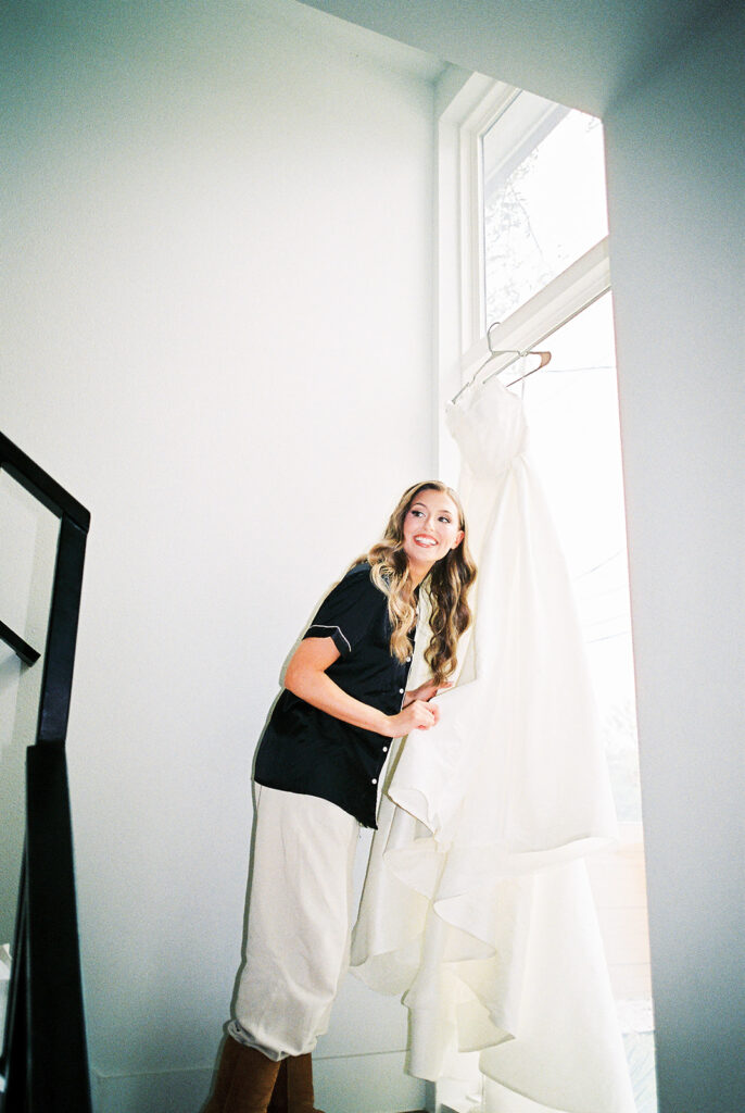 bride and groom getting ready for an Intimate wedding at Springdale Station in Austin, Texas photographed on film
