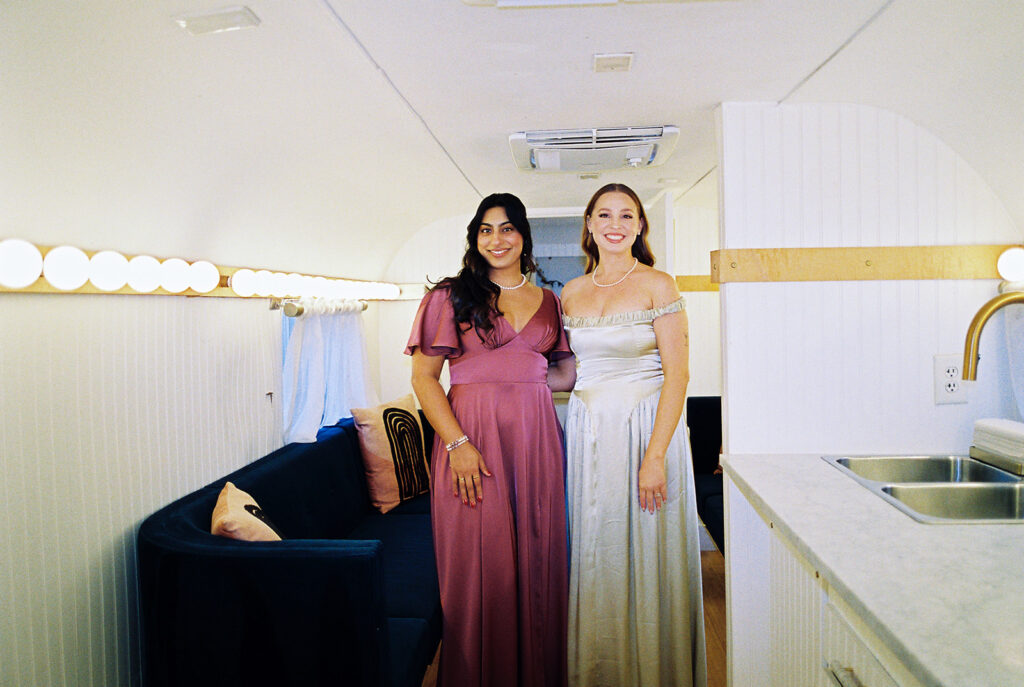bride and groom getting ready for an Intimate wedding at Springdale Station in Austin, Texas photographed on film