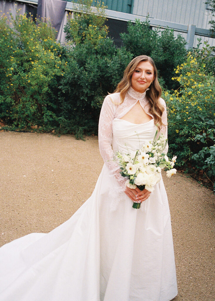 Bride and bridesmaids portrait outdoors at Springdale Station wedding venue