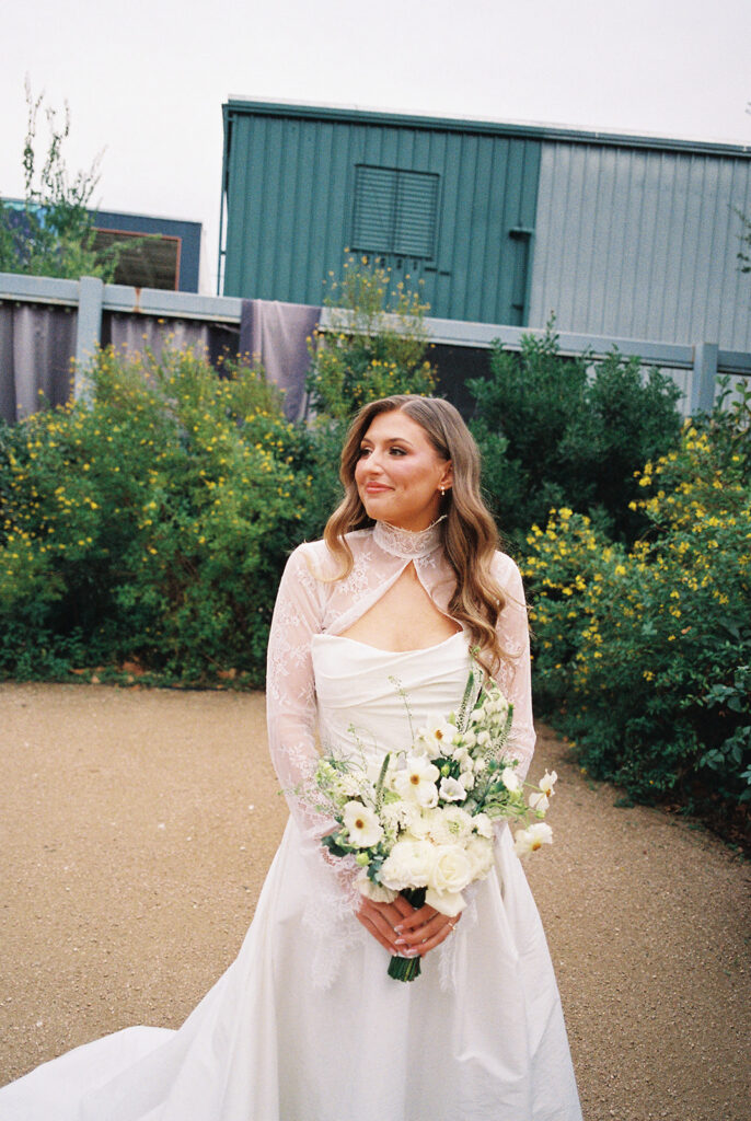 Bride and bridesmaids portrait outdoors at Springdale Station wedding venue