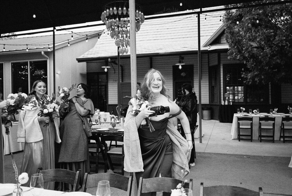 Joyful wedding reception with dancing at Springdale Station on film