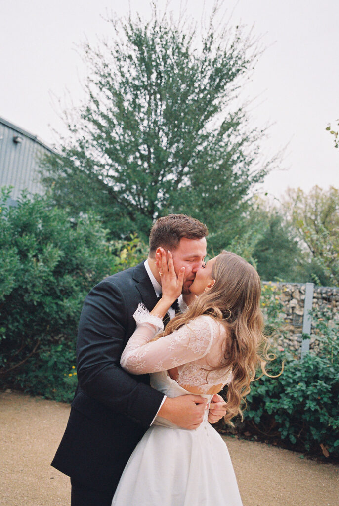 Emotional first look during an intimate wedding in Austin, Texas photographed on film