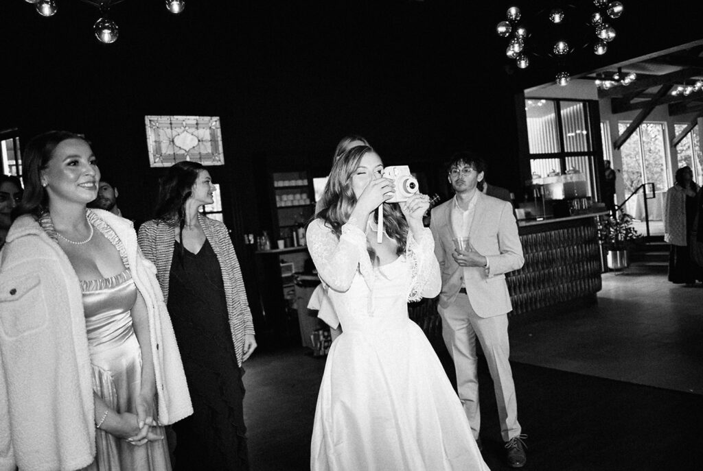 Bride and groom portrait with flash film photography at Springdale Station wedding venue