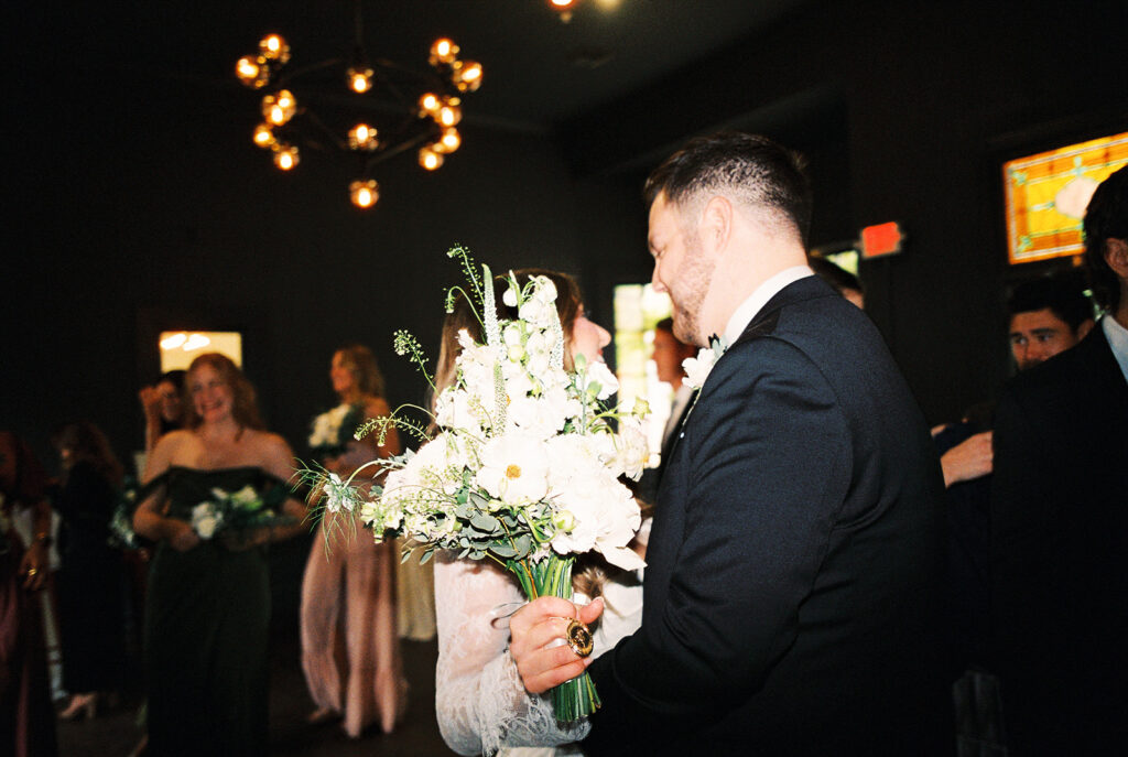 Bride and groom portrait with flash film photography at Springdale Station wedding venue