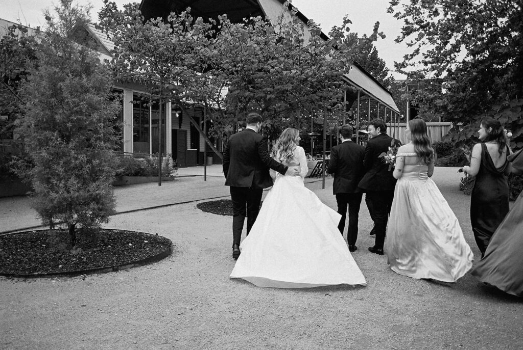 Outdoor wedding celebration at Springdale Station on film