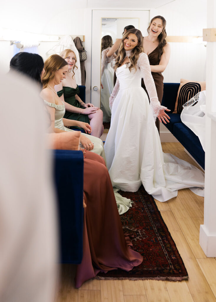 bride and groom getting ready for an Intimate wedding at Springdale Station in Austin, Texas photographed on film