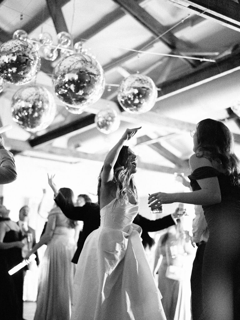 Guests dancing during a lively wedding reception in Austin, Texas on film