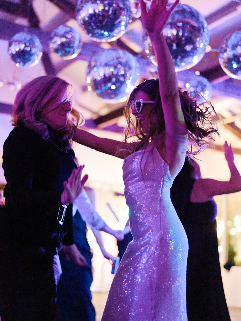 Guests dancing during a lively wedding reception in Austin, Texas on film