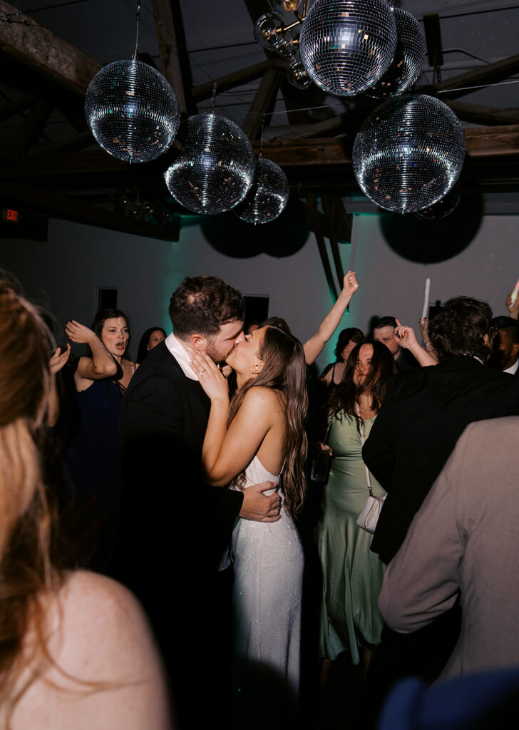 Guests dancing during a lively wedding reception in Austin, Texas on film