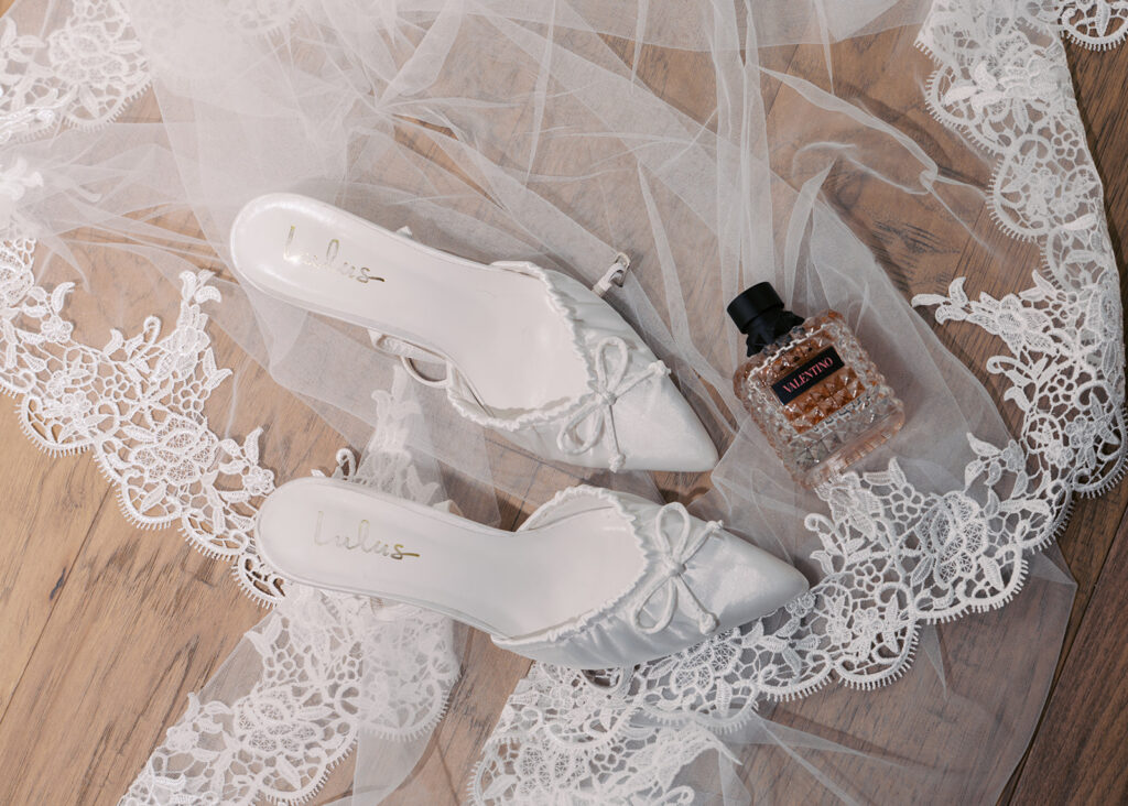 bride and groom getting ready for an Intimate wedding at Springdale Station in Austin, Texas photographed on film