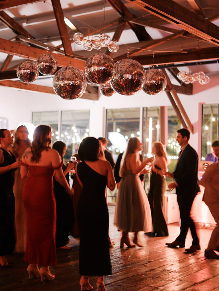 Guests dancing during a lively wedding reception in Austin, Texas on film