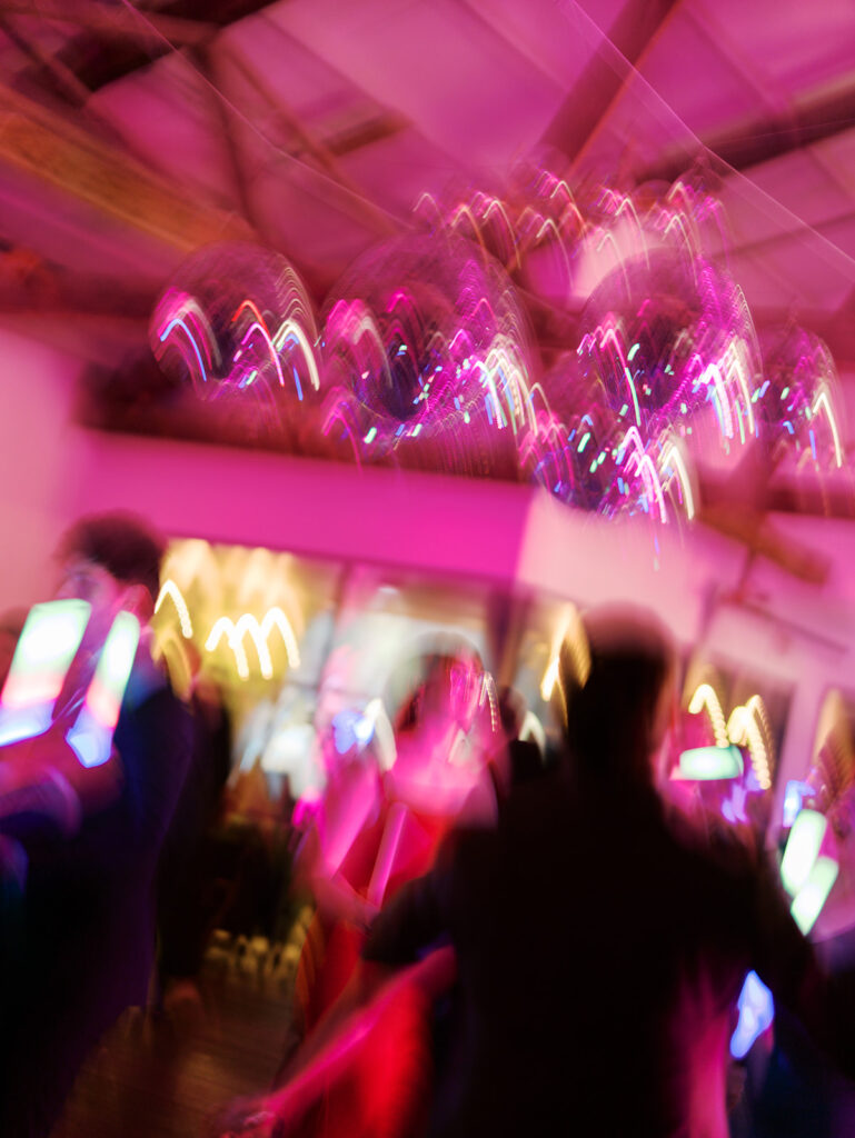Guests dancing during a lively wedding reception in Austin, Texas on film