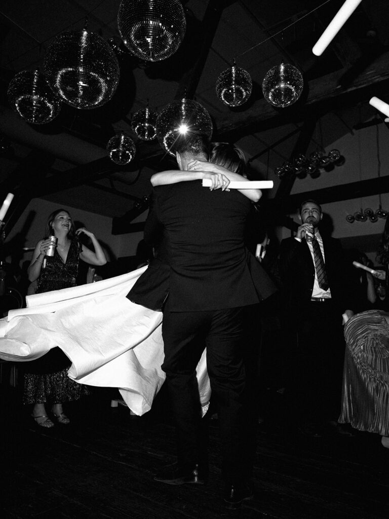 Guests dancing during a lively wedding reception in Austin, Texas on film