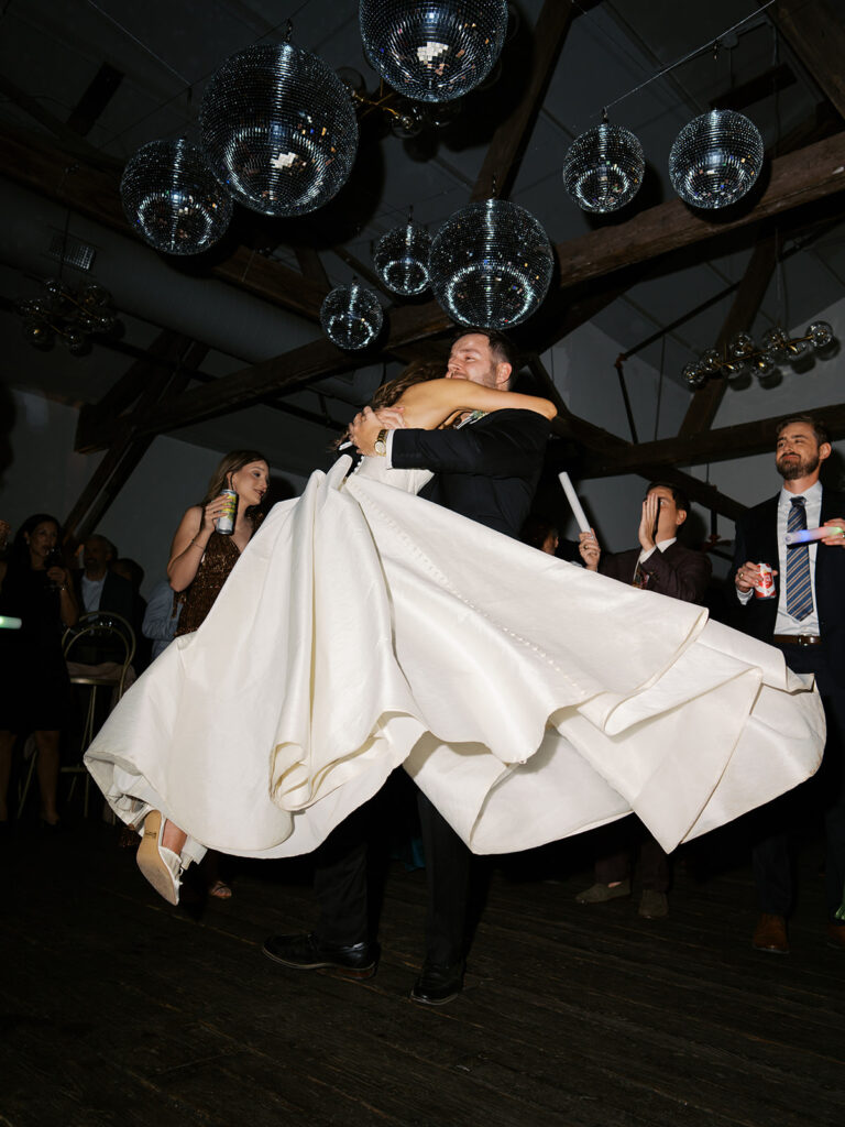 Guests dancing during a lively wedding reception in Austin, Texas on film