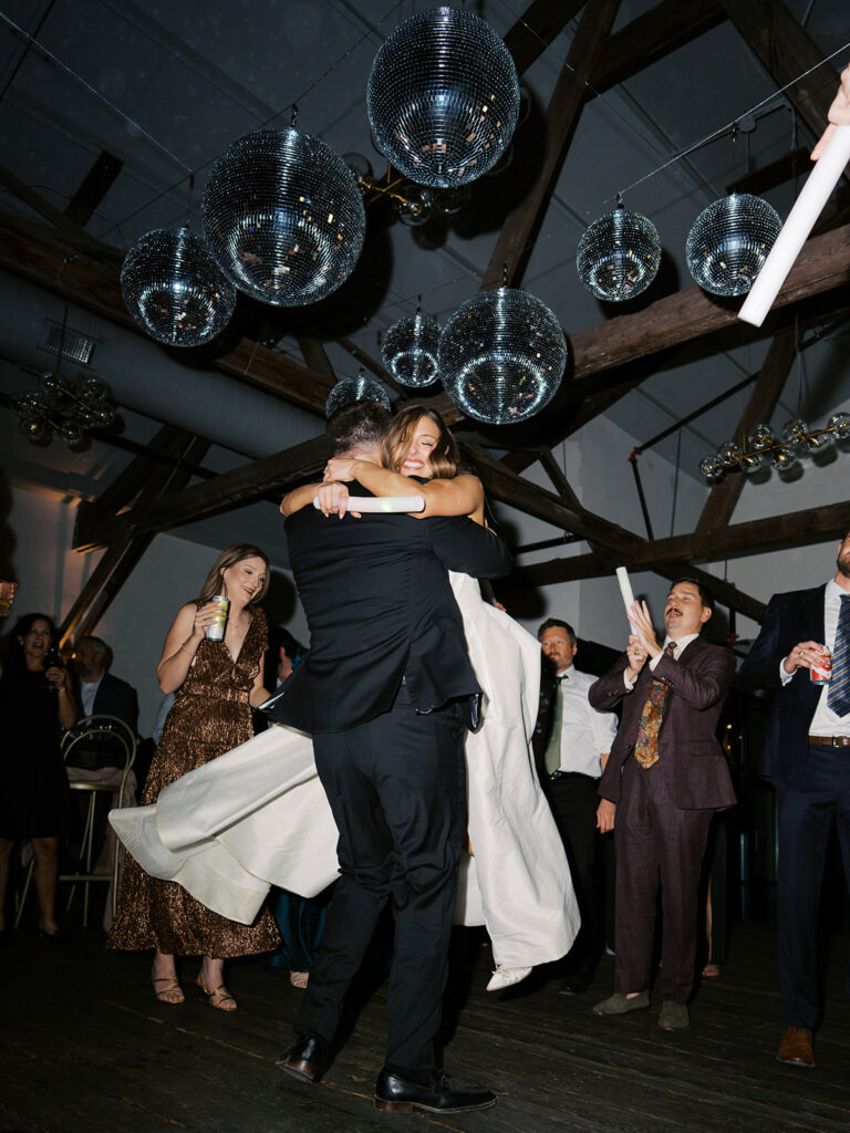 Guests dancing during a lively wedding reception in Austin, Texas on film