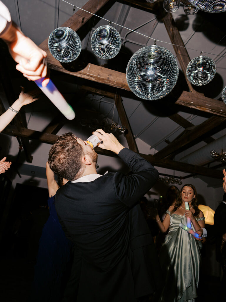 Guests dancing during a lively wedding reception in Austin, Texas on film