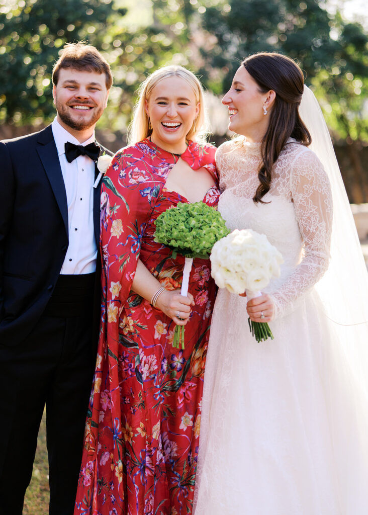 Joyful wedding party and newlyweds celebrating their Southwest School of Art wedding in San Antonio