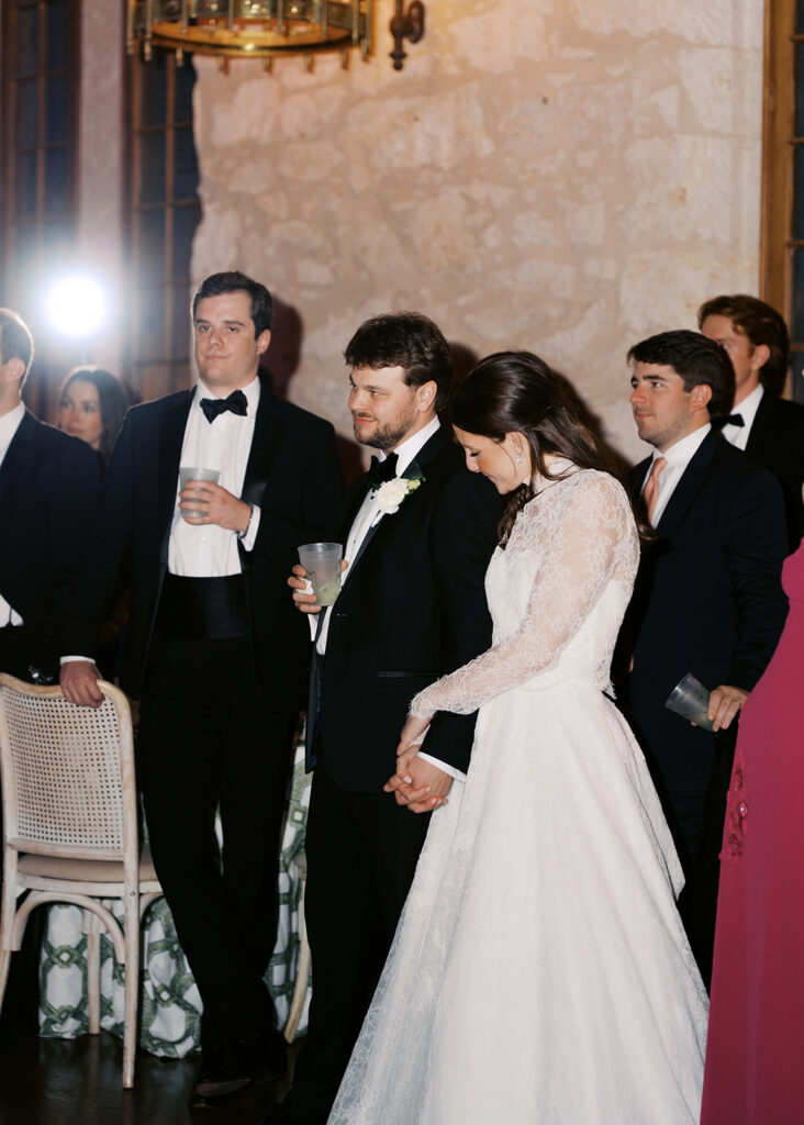 Dance floor at the reception uring a winter wedding at the Southwest School of Art in San Antonio on film
