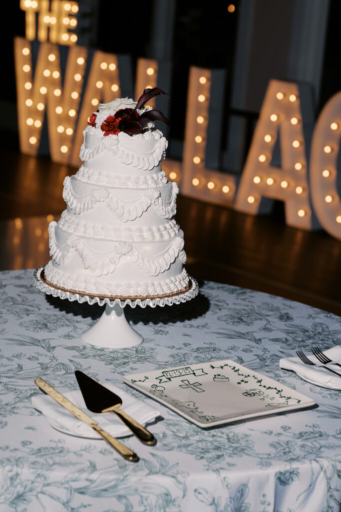 bride and groom cake cutting at vintage villas wedding