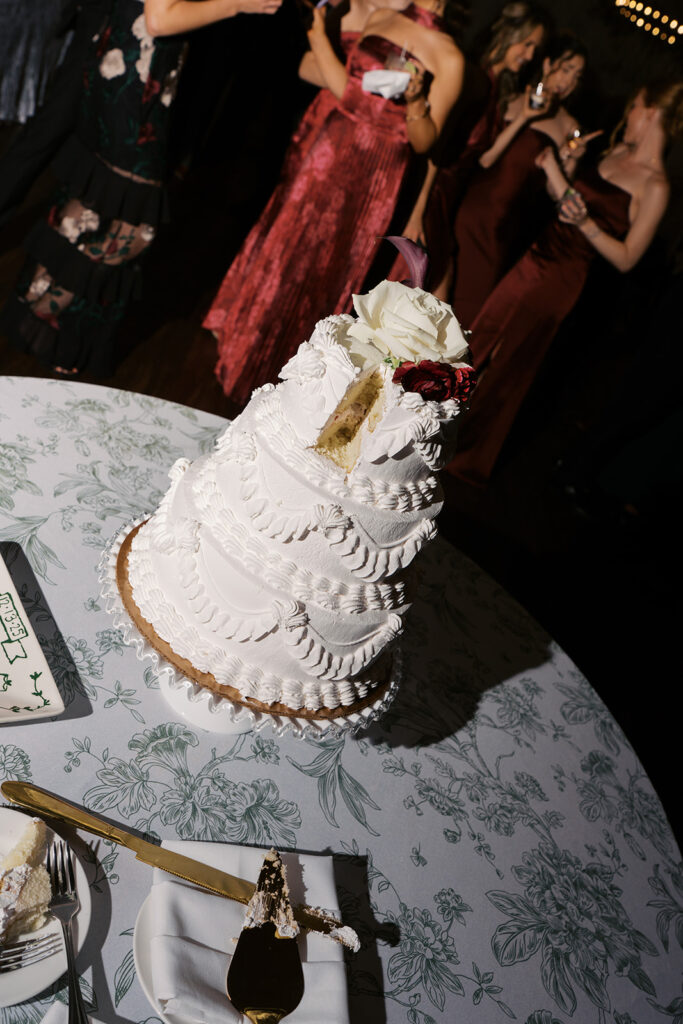 bride and groom cake cutting at vintage villas wedding