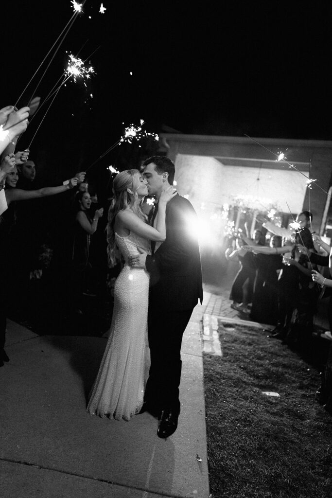 bride and groom send-off moment with newlyweds at Vintage Villas