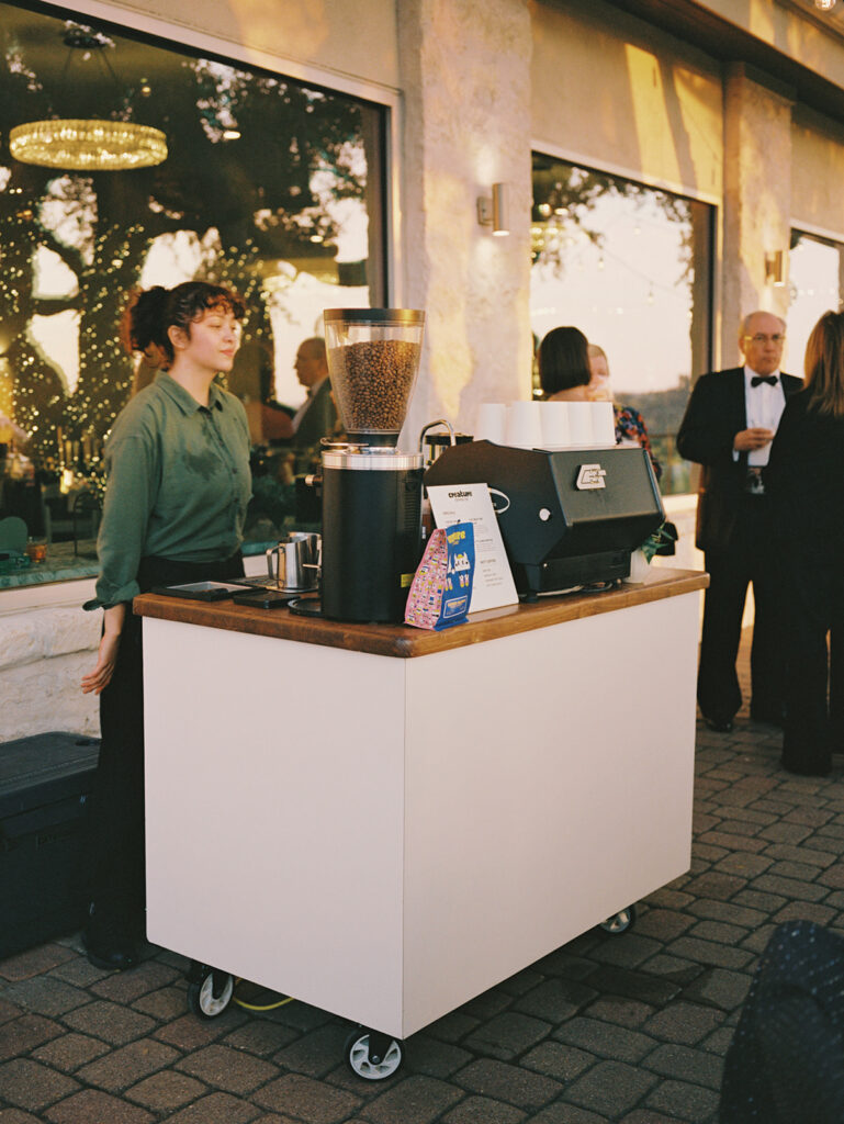 Guests mingling during outdoor cocktail hour at Vintage Villas, captured on 35mm film