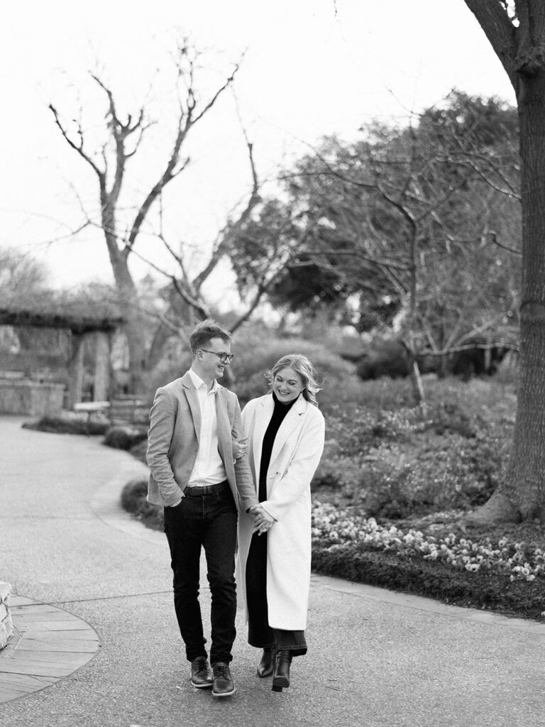Candid moments captured on film during an arboretum engagement session