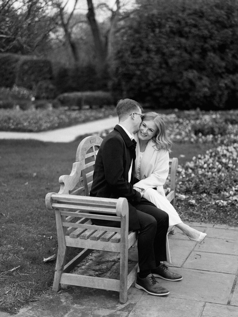 Sierra and Liam walking together during their Dallas Arboretum engagement photos