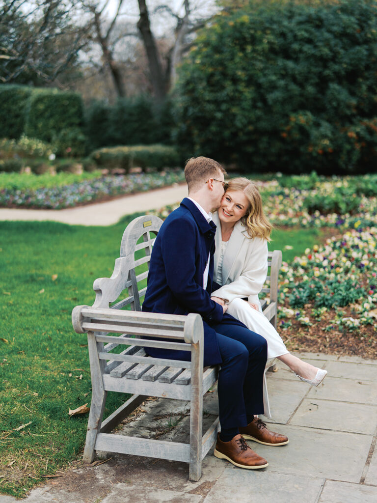Sierra and Liam walking together during their Dallas Arboretum engagement photos