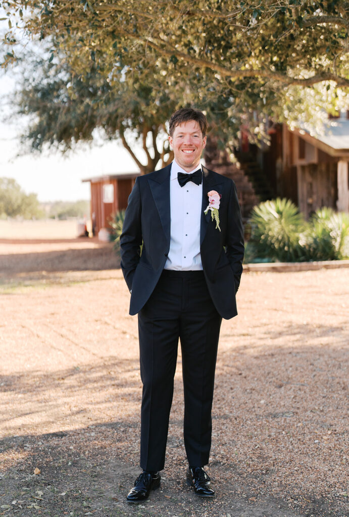 Colorful outdoor wedding ceremony at Rancho Pillow Round Top Texas