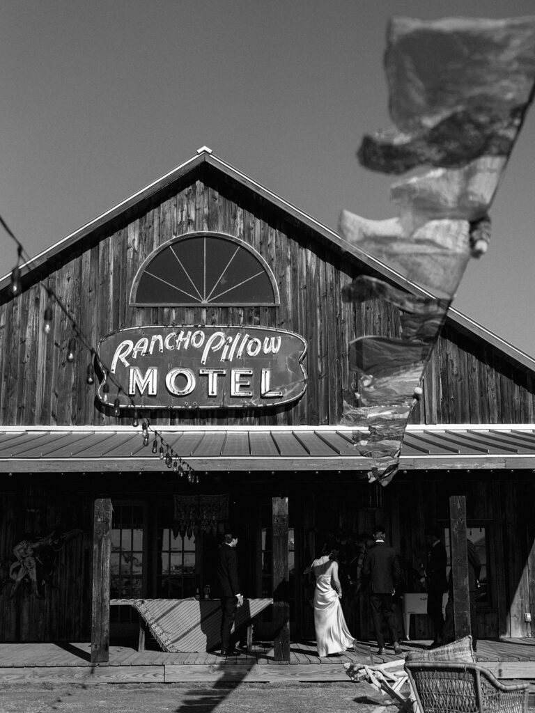 Colorful outdoor wedding ceremony at Rancho Pillow Round Top Texas