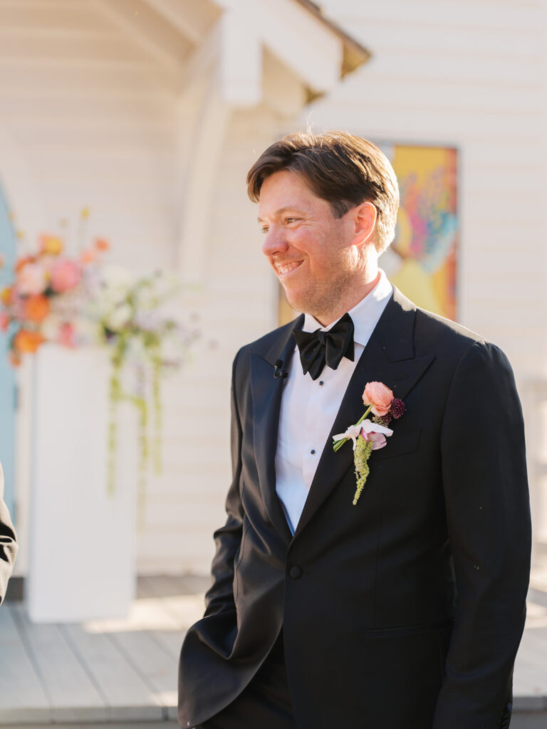 Colorful outdoor wedding ceremony at Rancho Pillow Round Top Texas