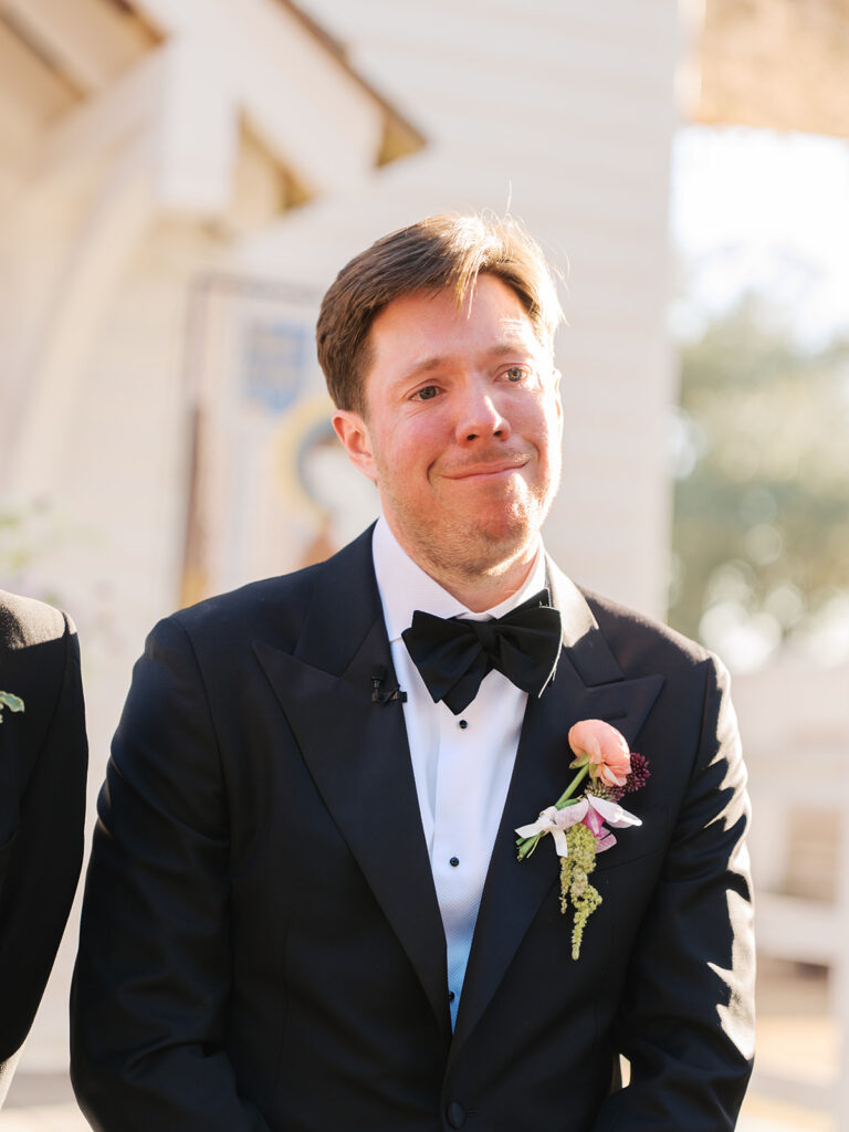 Colorful outdoor wedding ceremony at Rancho Pillow Round Top Texas
