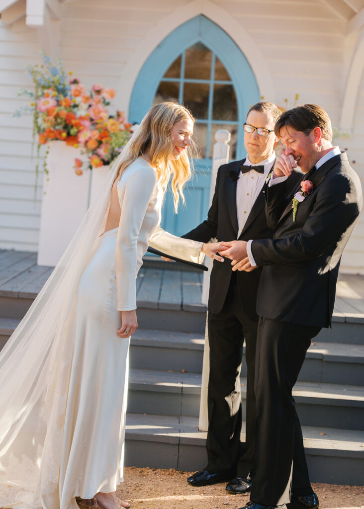 Colorful outdoor wedding ceremony at Rancho Pillow Round Top Texas