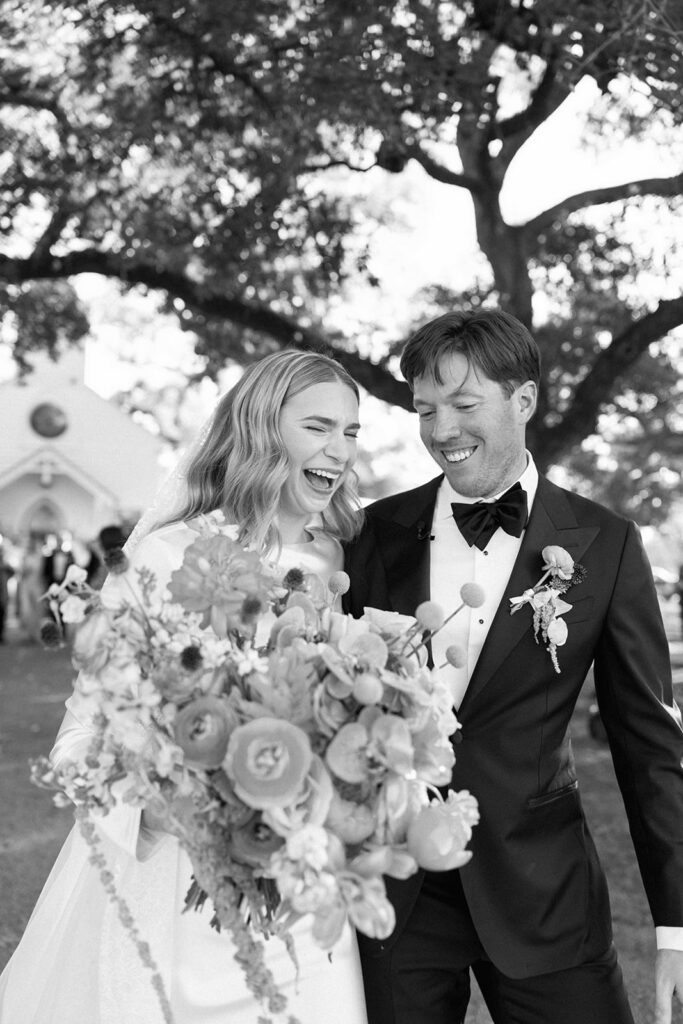 Colorful outdoor wedding ceremony at Rancho Pillow Round Top Texas