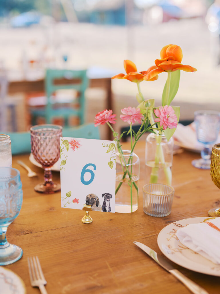 Colorful outdoor wedding ceremony at Rancho Pillow Round Top Texas